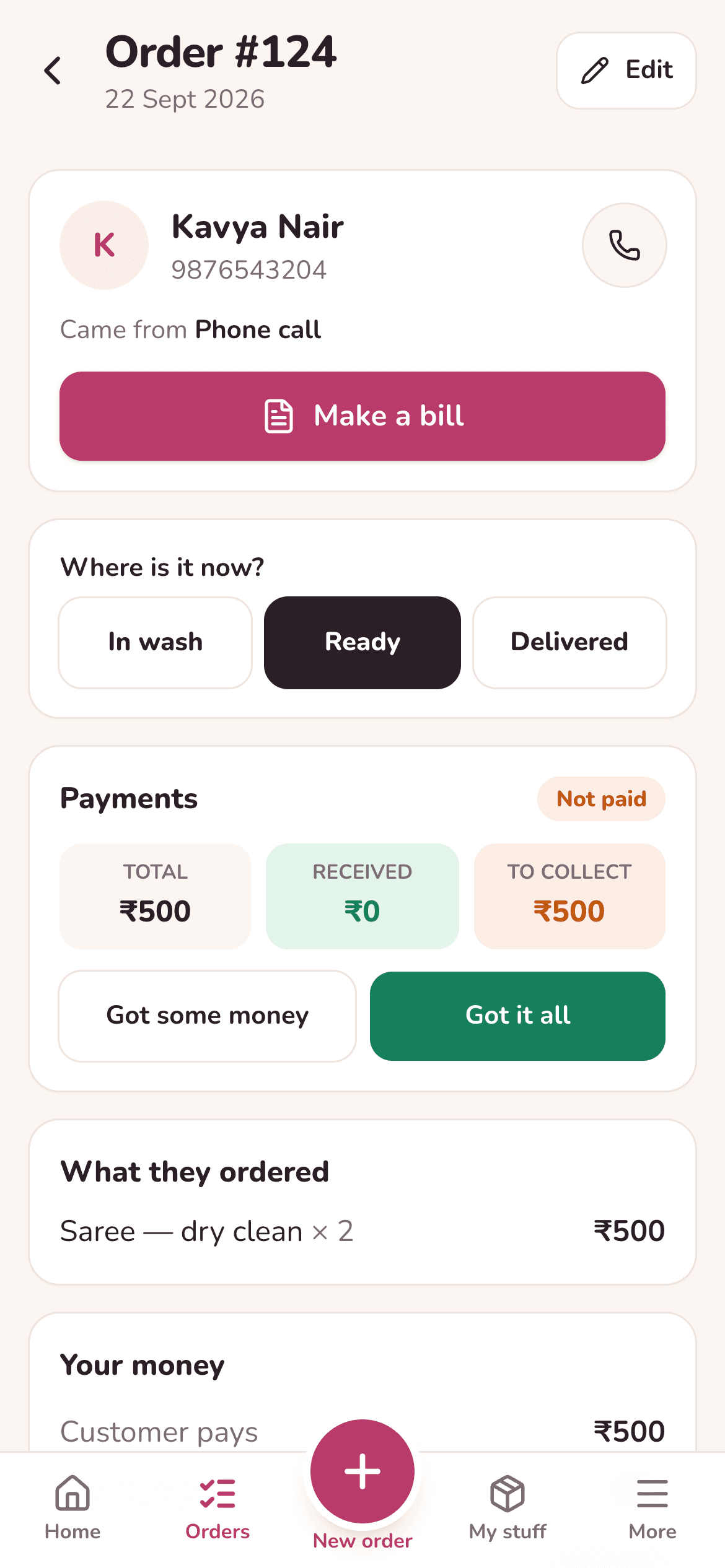 A laundry order in Kipsy: shirts, trousers and a saree, with what is still to collect